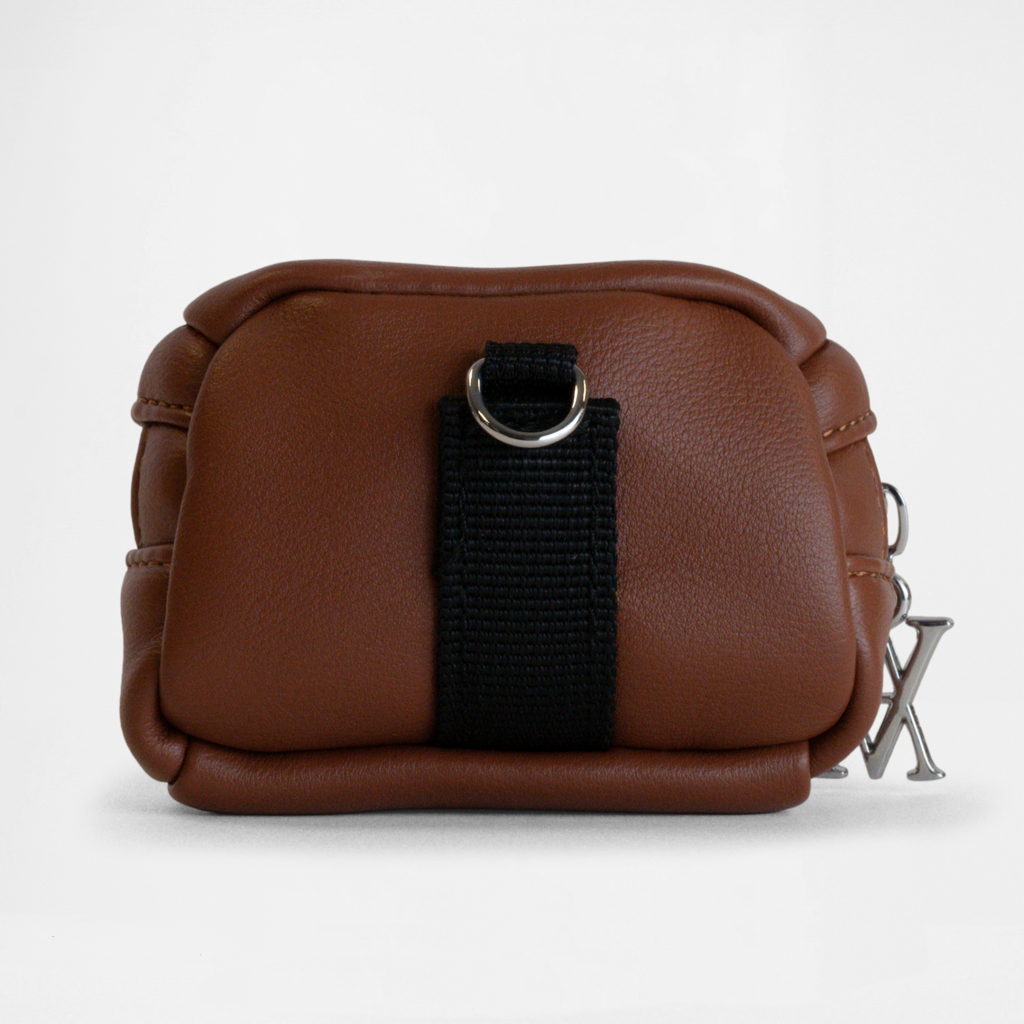 Back view of the Memphis Earbud Case in Tan with clip detail