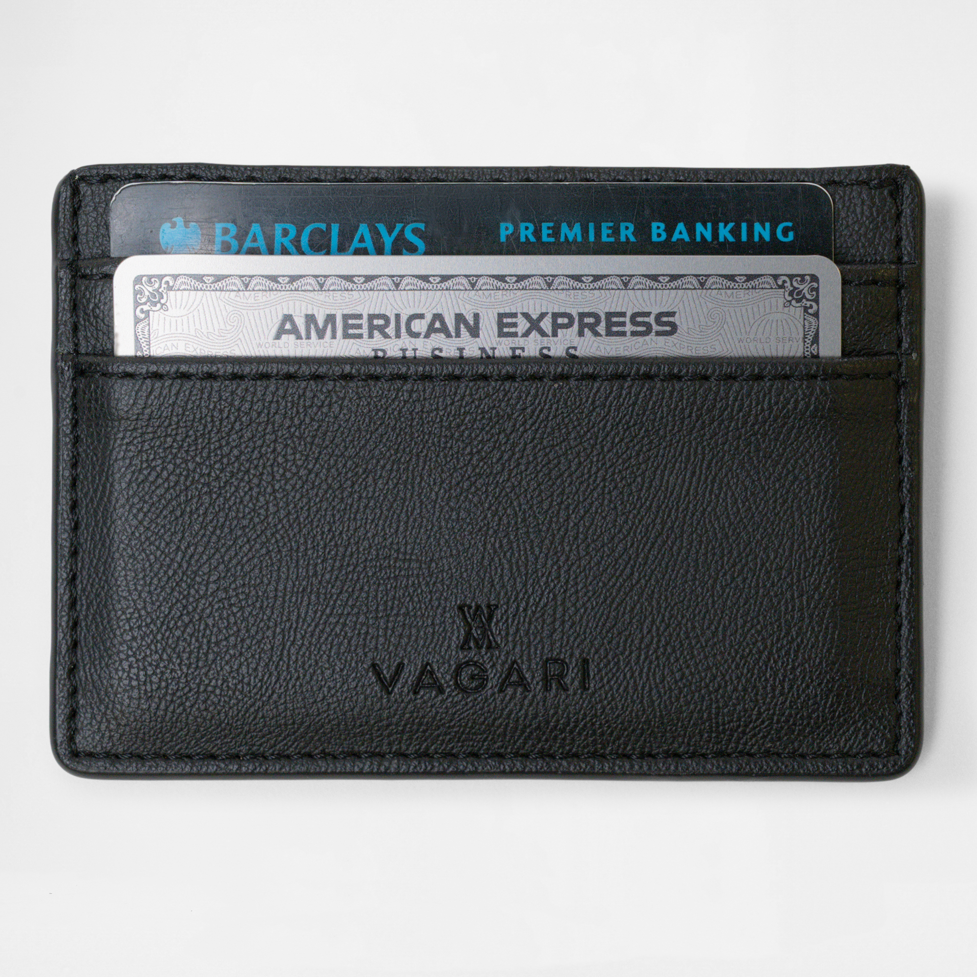 Front view of the Zurich Card Wallet in Black by Vagari with cards inserted, Vagari logo visible