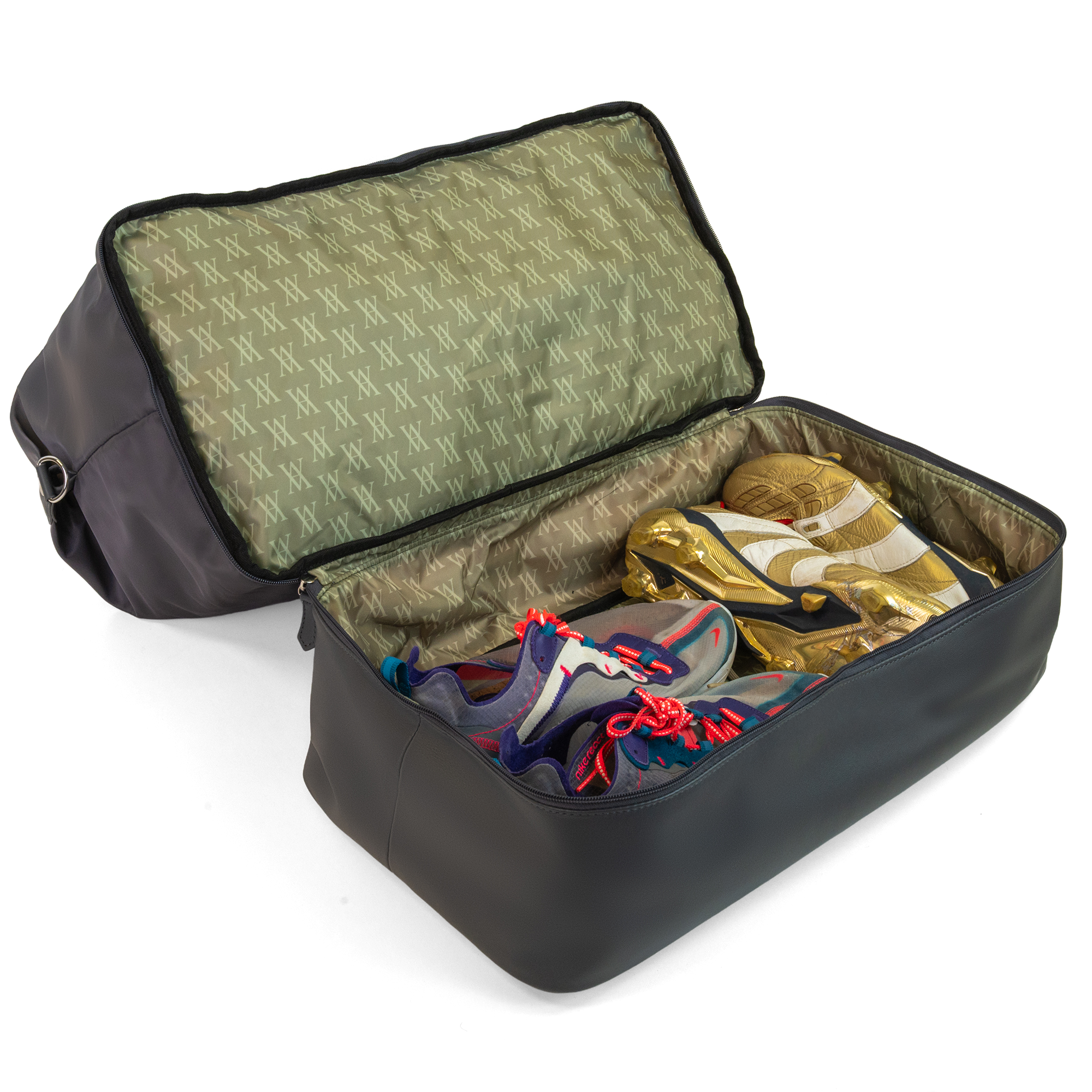 Open shoe compartment of the Athens Gym Bag in Graphite, storing trainers and footwear