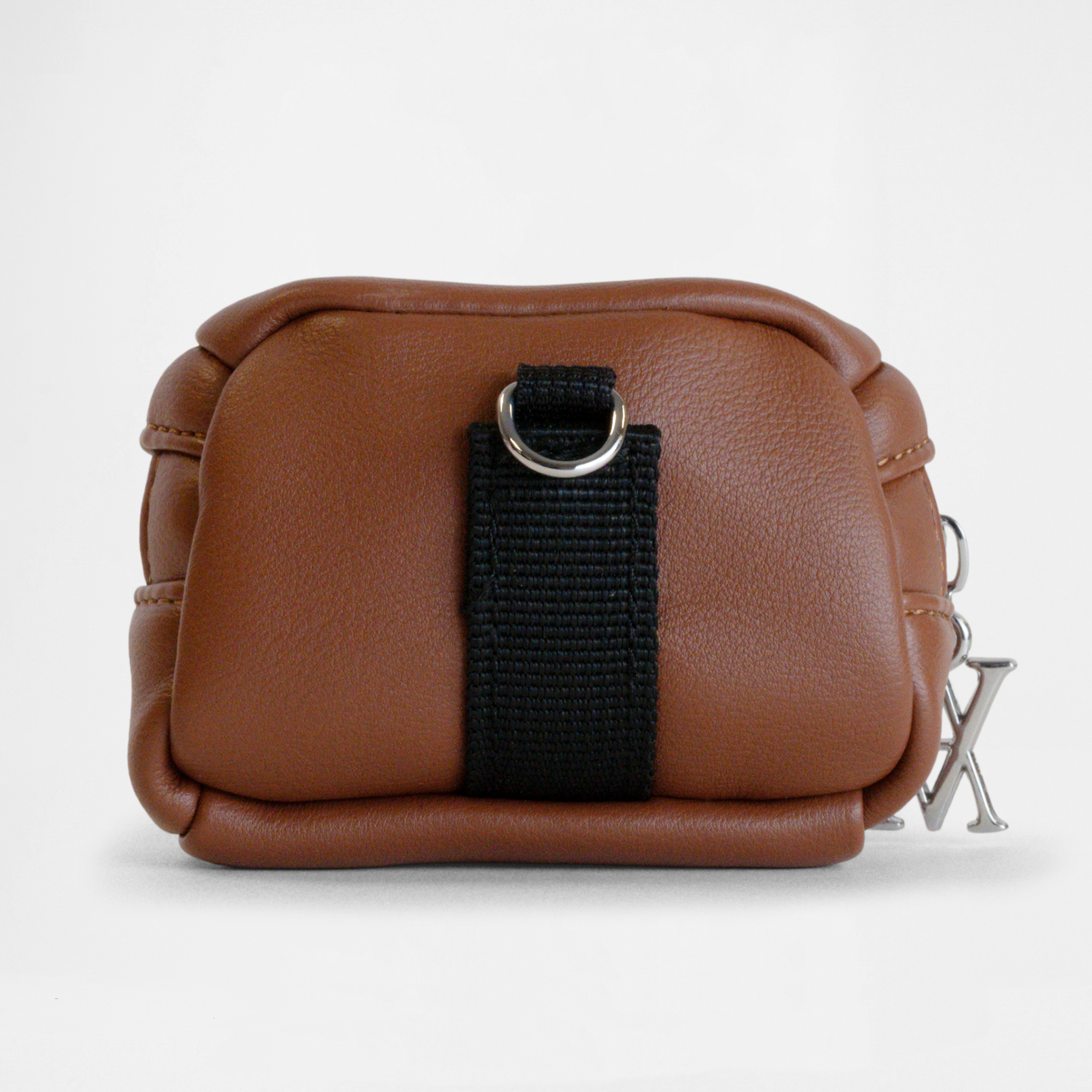 Back view of the Memphis Earbud Case in Tan with clip detail