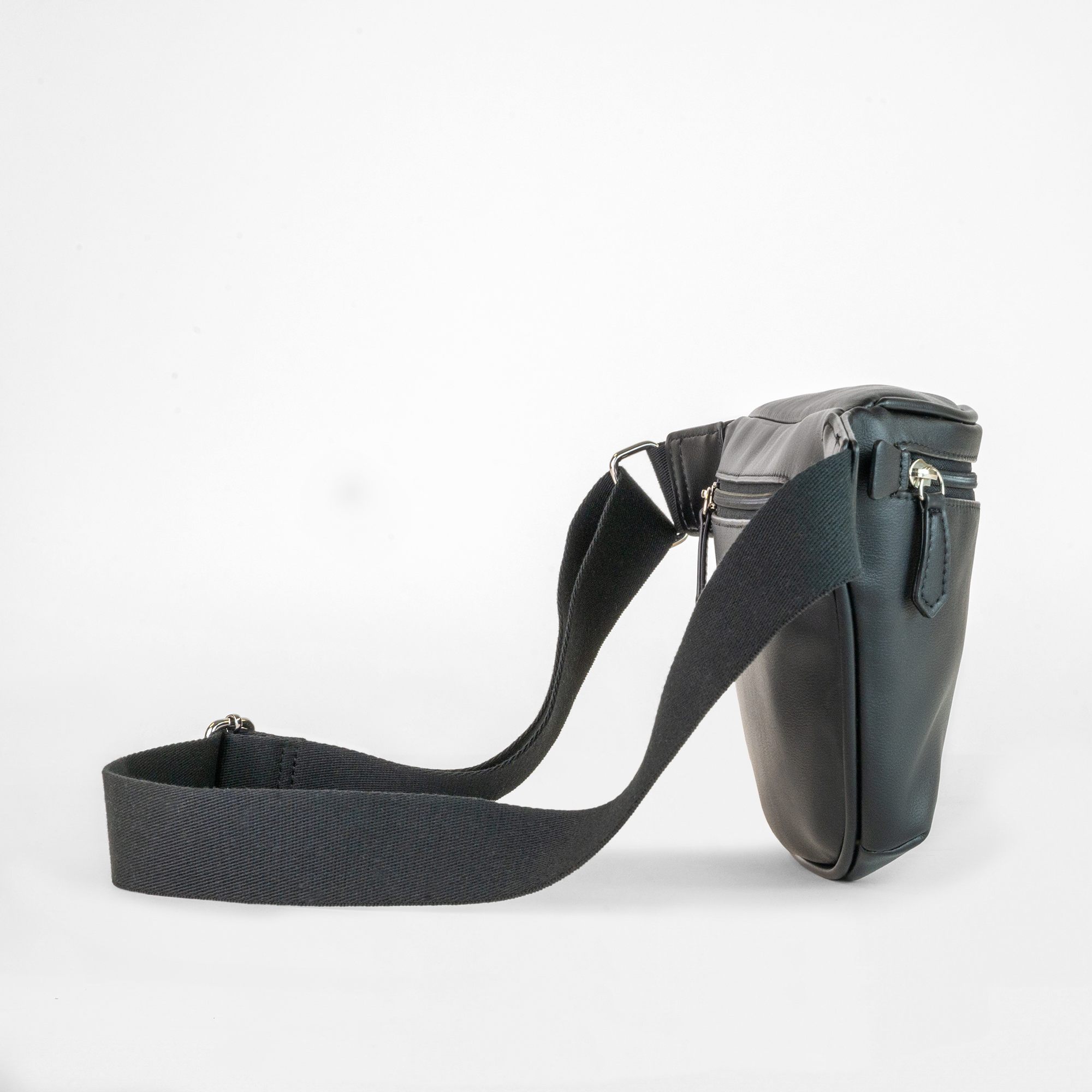 Side angle of the Miami Belt Bag in Black with adjustable strap